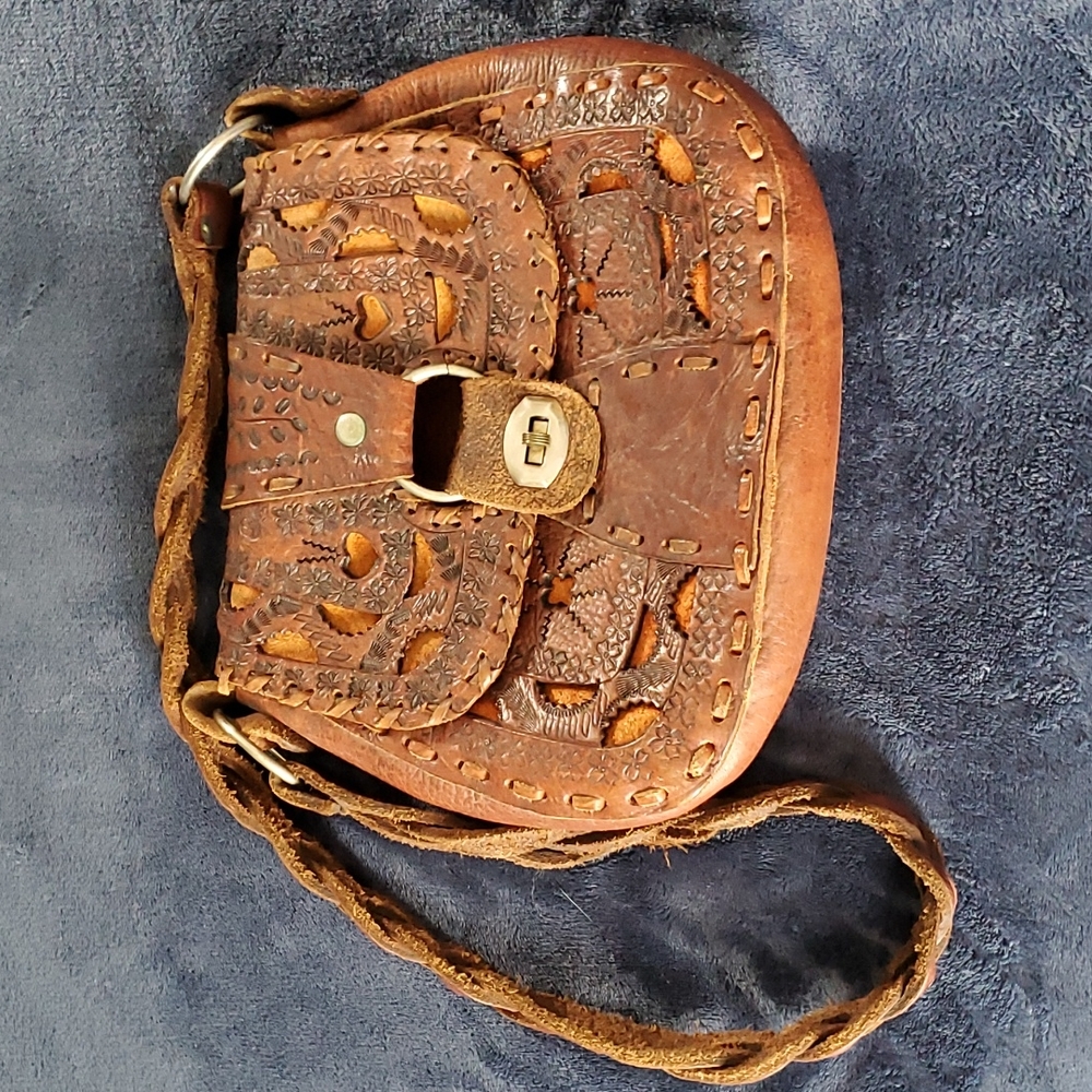 Vintage, hand stamped, leather with cut outs purse